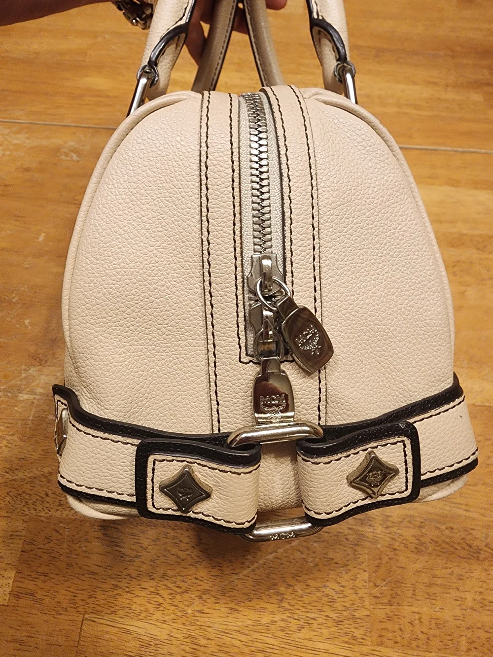 MCM cream leather Boston satchel featuring silver-toned hardware